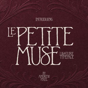 May include: A deep burgundy background featuring an embossed floral border and white text that reads: INTRODUCING LE PETITE MUSE LIGATURE TYPEFACE BY ANDREW PIXEL. The design displays a decorative, elegant font style with intricate, swirling vine patterns.
