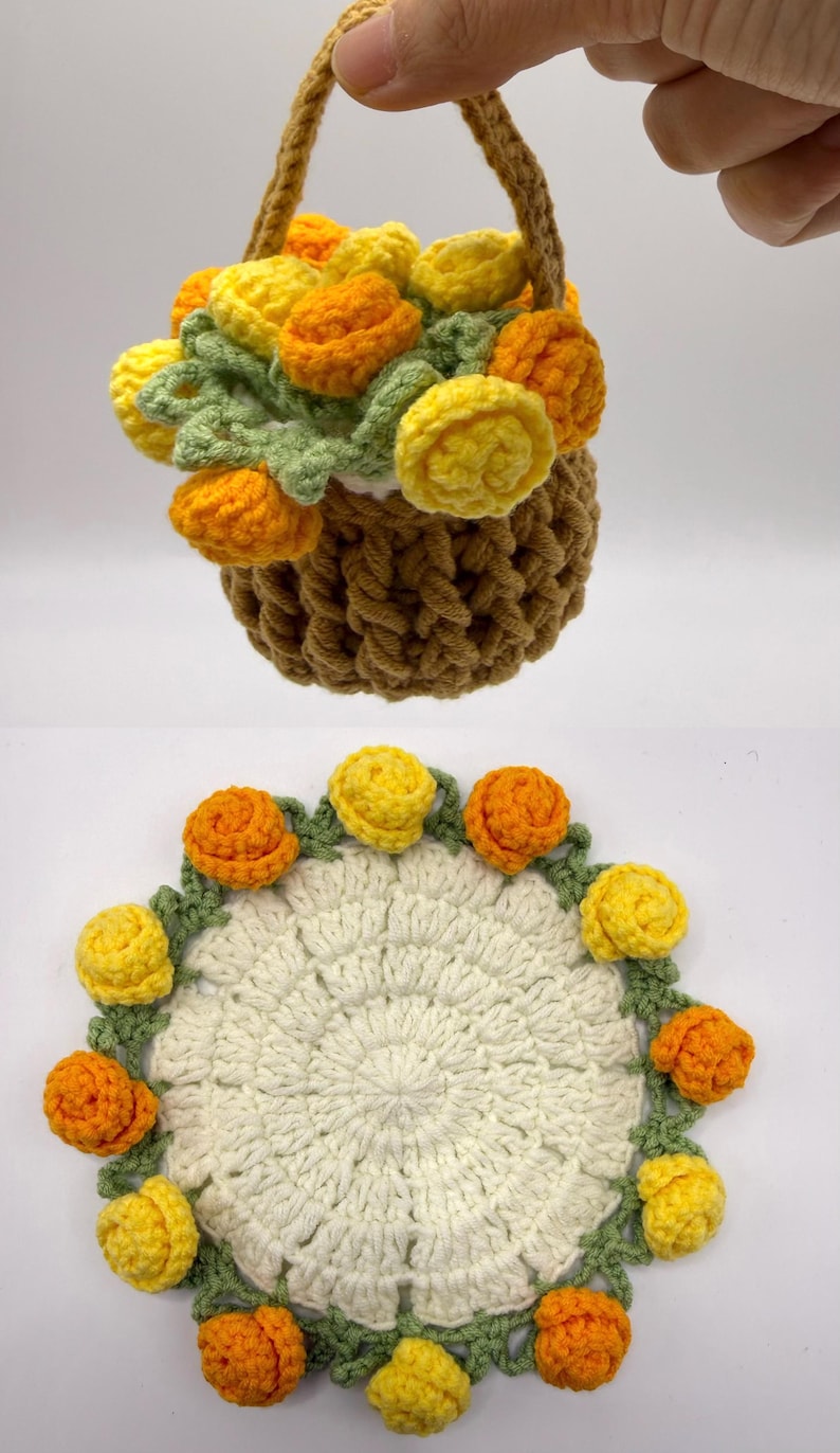 May include: A brown crocheted basket filled with yellow and orange flowers with green leaves, and a matching circular white crocheted doily featuring a border of alternating yellow and orange flowers with green stems and leaves.
