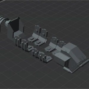 May include: A gray 3D-rendered model of a mechanical device, possibly a robotic arm or similar component. The model is composed of several distinct parts, including a claw-like structure, multiple rectangular sections, and a larger, angled body.