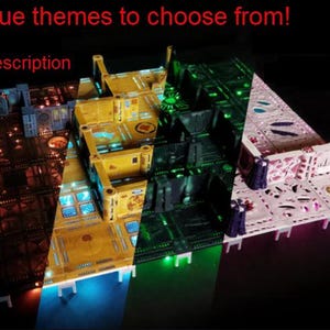 May include: Seven unique themes of a 3D printed modular tile set for tabletop gaming. The tiles are lit up in different colors, including red, yellow, green, blue, and pink.  The tiles are made of a white plastic material and have a detailed design.