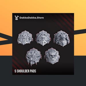 May include: Five gray shoulder pads with intricate, skull-like designs are displayed. The text "5 SHOULDER PADS" is at the bottom. The DakkaDakka.Store logo is in the upper left corner.