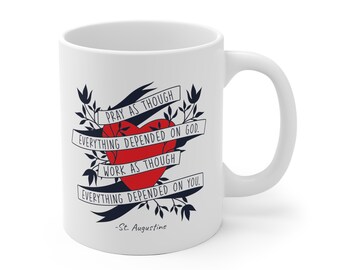 May include: White ceramic mug with a red heart and black text that reads "Pray as though everything depended on God. Work as though everything depended on you. -St. Augustine"