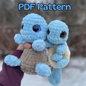 May include: A crochet pattern for two blue and brown turtle amigurumi toys. The PDF pattern includes instructions for making both the large and small turtle.