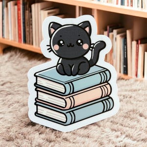 Adorable Black Cat Sticker on Books - Laptop Decal, Journal Decor, Planner Sticker
