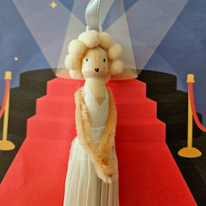 Clothespin doll of Marilyn Monroe, a cute ornament for your Christmas tree or near your movie&#39;s collection.