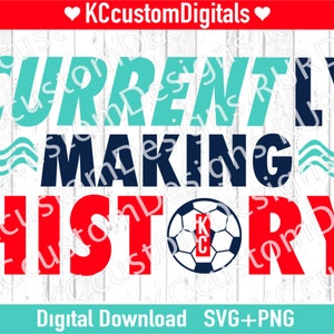 May include: A digital download of a graphic design featuring a soccer ball with the letters "KC" on it. The text "Currently Making History" is written in red, blue, and teal on a white woodgrain background.