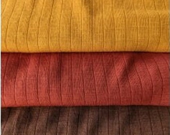 Knitted fabric, 100% Merino wool, Golden yellow Rib needle drop 215 gr