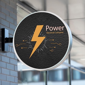 Puede incluir: Un letrero redondo con una textura de cuero negro y un gráfico de rayo dorado. El texto "Power Electrical Company" está en letras doradas.