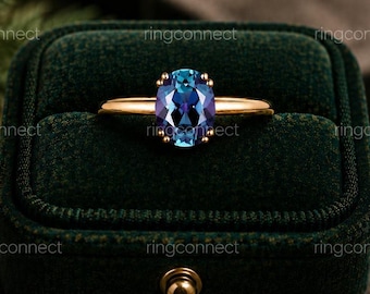 Anillo de compromiso único con piedra que cambia de color. Anillo de compromiso de alejandrita de forma ovalada. Anillo de boda de oro macizo con moissanita. Joyería hecha a mano para mujer.