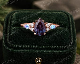 Anillo de compromiso de oro de 14k con piedra única que cambia de color. Anillo de compromiso de alejandrita de forma ovalada. Anillo de boda de oro con moissanita. Joyería hecha a mano para mujer.