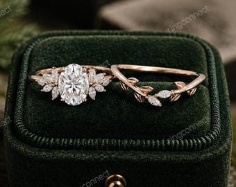 Anillo de compromiso de moissanita ovalada con diseño de hoja