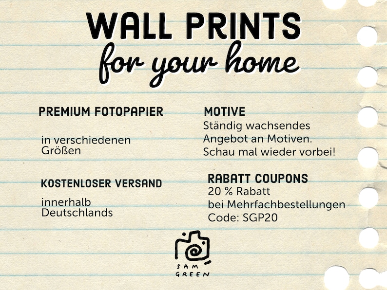 May include: An image with the text "WALL PRINTS for your home." Additional text includes "PREMIUM FOTOPAPIER," "MOTIVE," and "RABATT COUPONS." The image has a notebook paper background with a camera logo and the name "SAM GREEN."