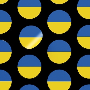 Puede incluir: Un patrón repetido de círculos azules y amarillos, que representan la bandera de Ucrania. Un círculo está ligeramente desplazado y parece ser una pegatina.