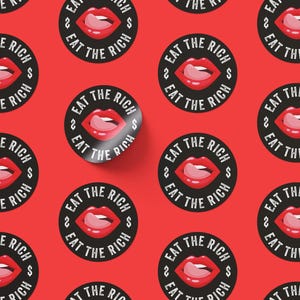 May include: A repeating pattern of black and white circular stickers with the text "Eat the Rich" in white and a red open mouth with a tongue sticking out. The background is a solid red color.