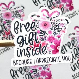 May include: A sticker with a pink and white floral design and the text "free gift inside because I appreciate you".