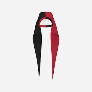 May include: A two-toned hood featuring a split design with one side in solid black and the other in solid red. The hood includes long, pointed fabric extensions hanging down on each side and a white interior lining visible at the face opening.