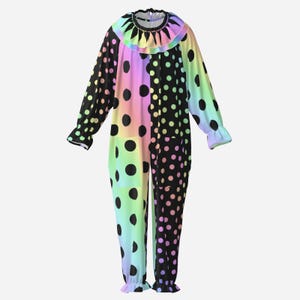 May include: A long-sleeved jumpsuit featuring a split design with one side in a rainbow gradient and the other in solid black, both covered in black polka dots. The garment includes a ruffled collar and ruffled cuffs at the wrists and ankles.