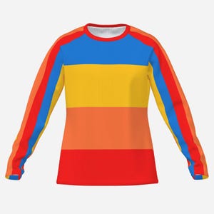 May include: A long-sleeved shirt featuring horizontal stripes in blue, yellow, orange, and red across the torso. The sleeves display vertical stripes in red, orange, yellow, and blue. The garment has a round neckline and a white interior collar.