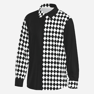 May include: A long-sleeve button-down shirt featuring a split design. The left side and right sleeve are solid black, while the right side and left sleeve display a black and white diamond checkerboard pattern. It has a standard collar and cuffs.