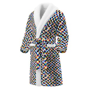 May include: A full-length, patterned robe with a white, fluffy collar and cuffs. The robe features a geometric design in a variety of colors, including blue, yellow, and red. It has a matching belt and two front pockets. The robe is made of a soft material.