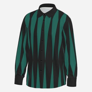 May include: A long-sleeve button-down shirt featuring a repeating vertical pattern of alternating black and dark teal diamond-like shapes. The shirt has a solid black collar, a front button placket with black buttons, and long sleeves with cuffs.