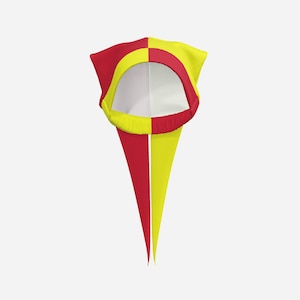 May include: A jester-style hat featuring a split design with vibrant red and yellow panels. The headpiece includes a circular opening with a contrasting border and two long, pointed fabric tails extending downward from the base of the cap.