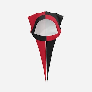 May include: A two-toned hood featuring a split design with one side in solid red and the other in solid black. The hood has a circular face opening with a red and black border and two long, pointed fabric tails extending downward from the base.