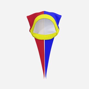 May include: A jester hat featuring a split design with one side in red and the other in blue. The hat has a bright yellow circular trim around the face opening and two long, pointed fabric tails extending downward in matching red and blue colors.