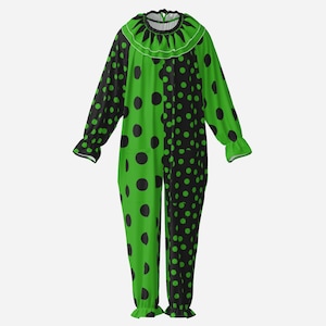 Puede incluir: Un mono de manga larga con un diseño dividido que presenta lunares negros sobre fondo verde en un lado y lunares verdes sobre fondo negro en el otro. La prenda incluye un cuello con volantes con detalles en negro y verde.