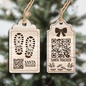May include: Two wooden Christmas ornaments with twine hangers. One features Santa's footprints and the text "Santa Claus" and "Santa Tracker". The other has a bow, QR code, and the text "Santa Tracker".