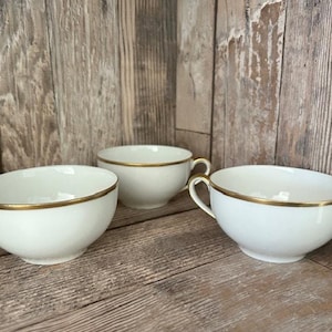 Juego de 3 tazas de té vintage Noritake blancas con detalles dorados, fabricadas en Japón.
