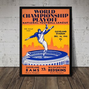 May include: A vintage poster advertising the 1945 National Football League Championship game between the Cleveland Rams and the Washington Redskins. The poster features a football player kicking the ball in front of a stadium. The text on the poster reads "World Championship Playoff, National Football League, 13th Annual Game, Cleveland Stadium, Dec. 16, 1945, 25c, Cleveland Rams vs. Washington Redskins, Western Champions, Eastern Champions."