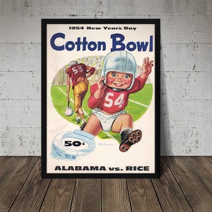 May include: A vintage poster for the 1954 Cotton Bowl game featuring a cartoon illustration of a baby in a football uniform. The poster reads "1954 New Year's Day Cotton Bowl Alabama vs. Rice".