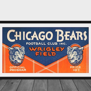 May include: A vintage blue and orange poster advertising the Chicago Bears Football Club Inc. at Wrigley Field. The poster features two wolf heads and the text "Official Program" and "Price 10¢".