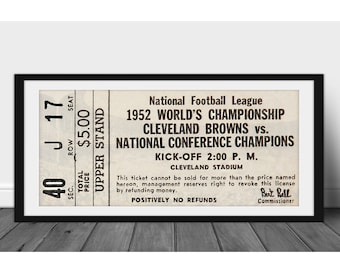 May include: A black and white ticket for the 1952 World's Championship game between the Cleveland Browns and the National Conference Champions. The ticket is for Section 40, Row J, Seat 17 and cost $5.00. The game was played at Cleveland Stadium and the kick-off time was 2:00 PM. The ticket states "Positively No Refunds" and is signed by Bert Bell, Commissioner.