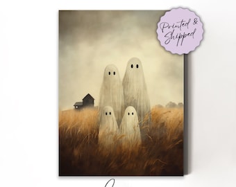May include: A digital illustration of four white ghosts standing in a field of tall grass. The ghosts have black eyes and are arranged in a line, with the largest ghost in the back and the smallest ghost in the front. The background is a hazy, muted brown color.
