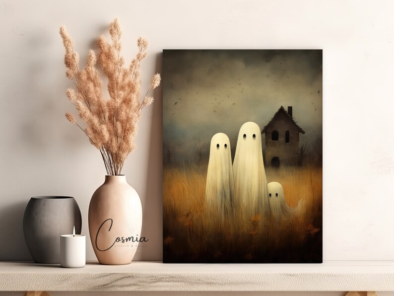 May include: A canvas print featuring a spooky Halloween scene. Three white ghost figures stand in a field of tall grass, with a haunted house in the background. The artwork has a vintage, painterly style.