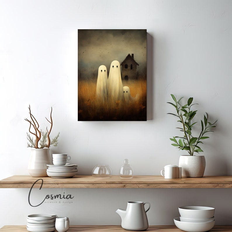 May include: A canvas print featuring a spooky scene with three white ghost figures in a field of tall grass, with a haunted house in the background. The artwork has a muted color palette with a dark, overcast sky.