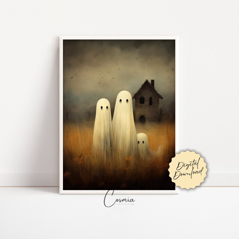 May include: A framed print featuring three friendly ghosts in a field of tall grass, with a spooky house in the background. The artwork has a vintage, slightly blurred aesthetic, with a muted color palette of beige, brown, and gray. The words "Digital Download" are visible.