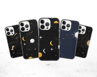 May include: Five different phone cases with a celestial theme. The cases are black with gold and white accents. The designs feature moons, stars, and planets.
