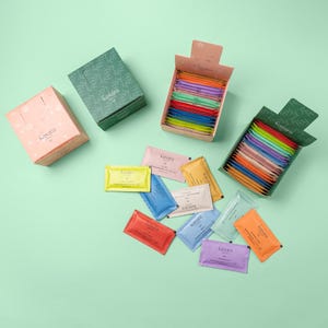 25 Scented Hand wipes with 10 different Cologne from Kasara Atelier Perfumed refreshing towels.