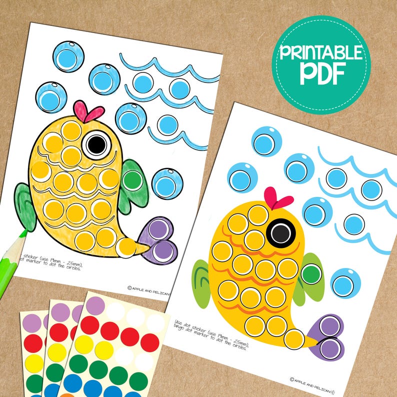 May include: Two printable worksheets featuring a yellow fish with a green fin and purple tail. The fish is made up of circles that can be filled in with stickers or markers. The text on the worksheets reads "sticker (use Min. 25mm) or marker to dot the circles" and "use dot sticker (use Min. 25mm) or bingo dot marker to dot the circles".