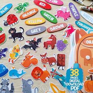 May include: A set of 38 printable pages featuring colorful illustrations of animals, objects, and color names. The pages are designed for children to learn colors and identify different objects.