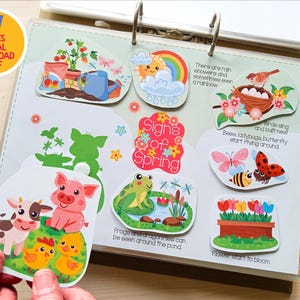 May include: A digital download PDF with 57 pages. The image shows a spring-themed activity book with colorful illustrations of a garden, farm animals, a rainbow, and insects. Text includes "Signs of Spring" and other descriptions.