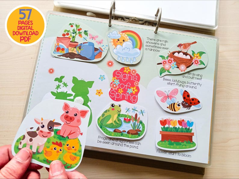 May include: A digital download PDF with 57 pages. The image shows a spring-themed activity book with colorful illustrations of a garden, farm animals, a rainbow, and insects. Text includes "Signs of Spring" and other descriptions.