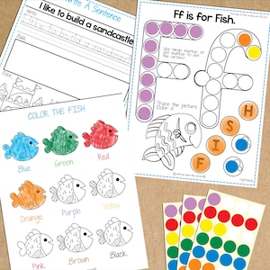 K&ouml;nnte beinhalten: Ein ausdruckbares Arbeitsblatt f&uuml;r Kinder, um den Buchstaben F zu lernen. Das Arbeitsblatt zeigt einen gro&szlig;en Buchstaben F mit Kreisen zum Ausmalen, ein Bild eines Fisches zum Nachzeichnen und Ausmalen sowie das Wort "FISCH" mit einzelnen Buchstaben zum Ausmalen. Das Arbeitsblatt enth&auml;lt auch eine Malen-nach-Zahlen-Aktivit&auml;t mit einem Fisch und einer Reihe von Farbkreisen.