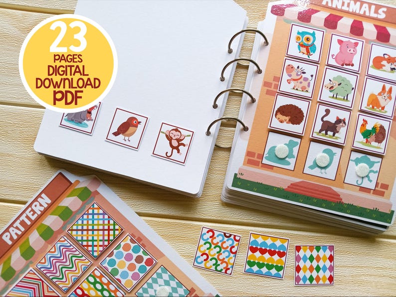 K&ouml;nnte beinhalten: Ein farbenfrohes, interaktives Lernbuch f&uuml;r Kinder mit 23 Seiten voller Tier-Zuordnungsaktivit&auml;ten. Das Buch hat einen leuchtend gelben Einband mit dem Text "23 Seiten Digitaler Download PDF". Das Buch ist ge&ouml;ffnet und zeigt eine Seite mit verschiedenen Tierillustrationen und Zuordnungsaktivit&auml;ten.