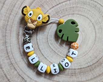 Pacifier clip lion king style yellow mouatrde green