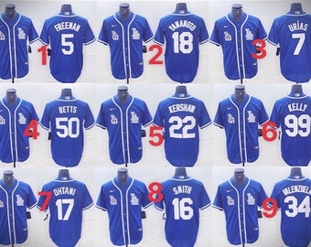 May include: Nine blue baseball jerseys with white lettering and numbers. The jerseys feature the Los Angeles Dodgers logo. The numbers on the jerseys are 1, 5, 18, 3, 7, 4, 50, 22, 6, 99, 7, 17, 8, 16, 9, and 34.