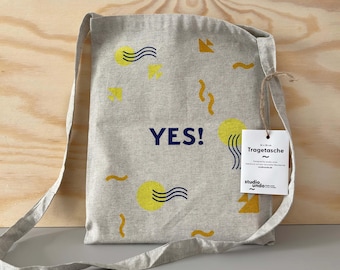 Bolso de tela estampado a mano, bolso shopping confeccionado en algodón prereciclado con serigrafía multicolor impresa por ambas caras, "¡Sí!" y "No".